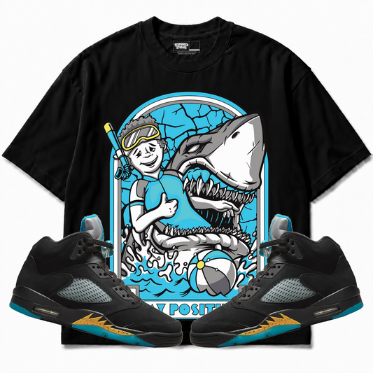 Rebranded Studios apparel — front styled with matching sneakers
