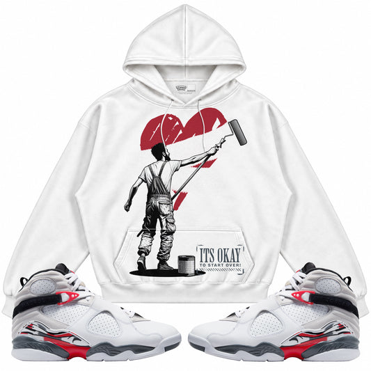 Rebranded Studios apparel — front styled with matching sneakers