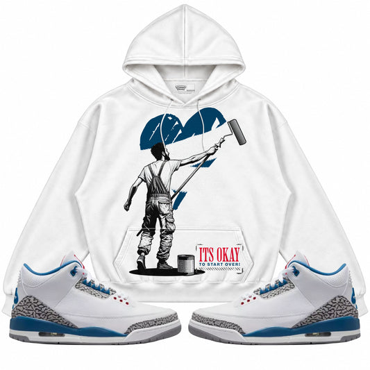 Rebranded Studios apparel — front styled with matching sneakers