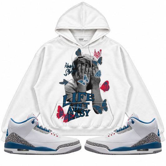 Rebranded Studios apparel — front styled with matching sneakers