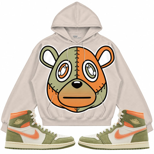 Rebranded Studios apparel — front styled with matching sneakers