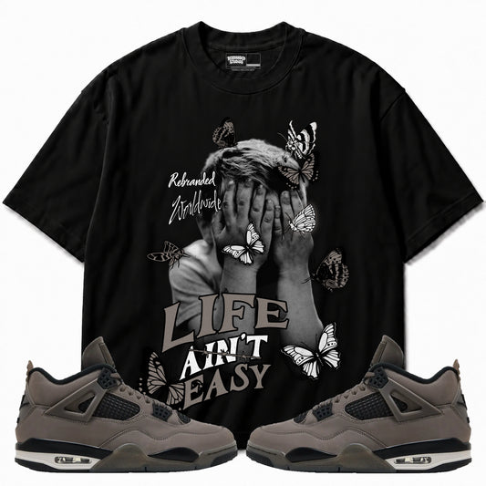 Rebranded Studios apparel — front styled with matching sneakers