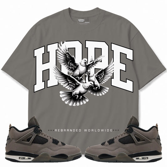 Rebranded Studios apparel — front styled with matching sneakers
