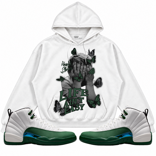 Rebranded Studios apparel — front styled with matching sneakers