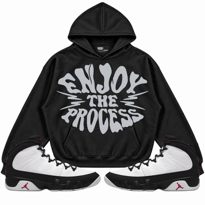Rebranded Studios apparel — front styled with matching sneakers