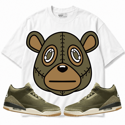 Rebranded Studios apparel — front styled with matching sneakers