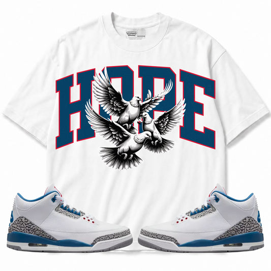 Rebranded Studios apparel — front styled with matching sneakers