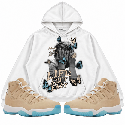 Rebranded Studios apparel — front styled with matching sneakers