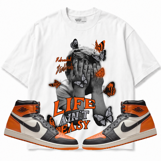 Rebranded Studios apparel — front styled with matching sneakers