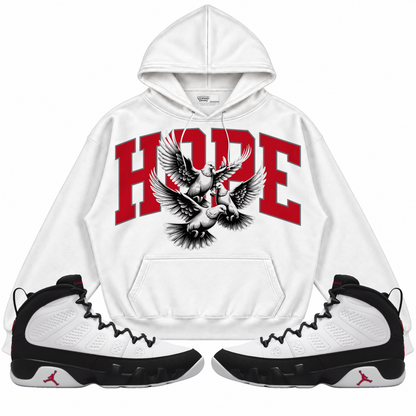 Rebranded Studios apparel — front styled with matching sneakers