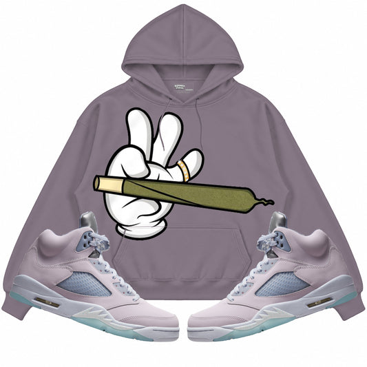 Rebranded Studios apparel — front styled with matching sneakers