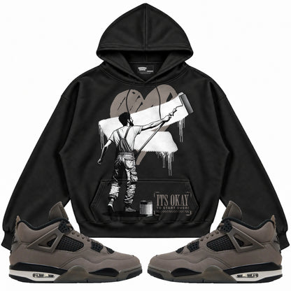 Rebranded Studios apparel — front styled with matching sneakers