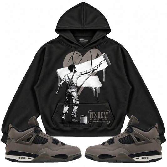 Rebranded Studios apparel — front styled with matching sneakers