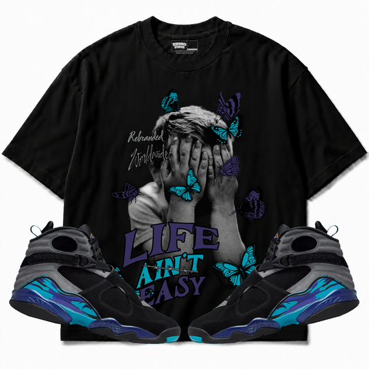 Rebranded Studios apparel — front styled with matching sneakers
