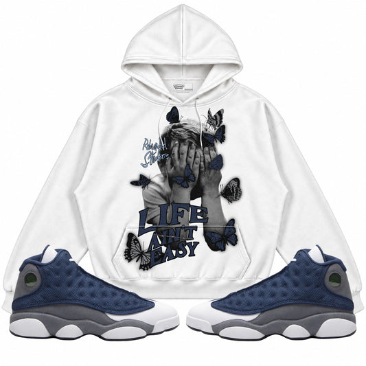 Rebranded Studios apparel — front styled with matching sneakers