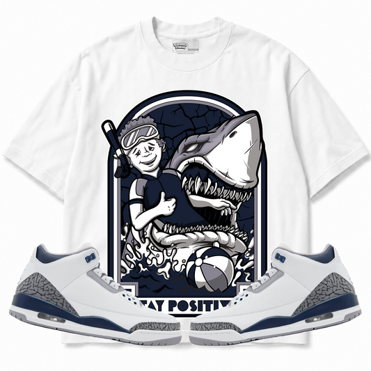 Rebranded Studios apparel — front styled with matching sneakers