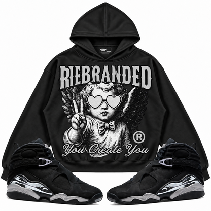 Rebranded Studios apparel — front styled with matching sneakers