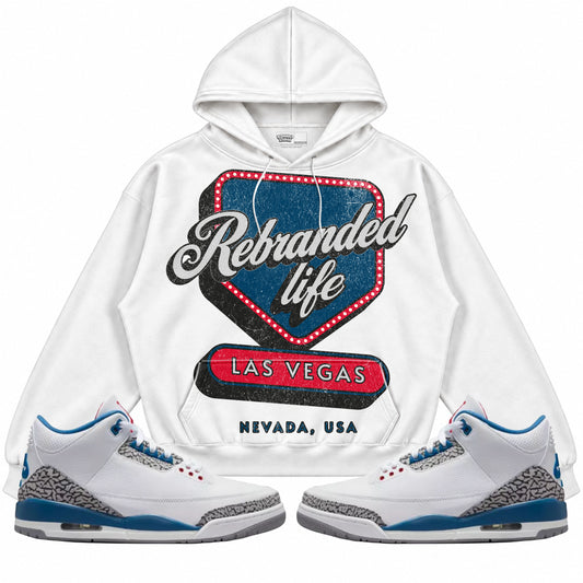 Rebranded Studios apparel — front styled with matching sneakers