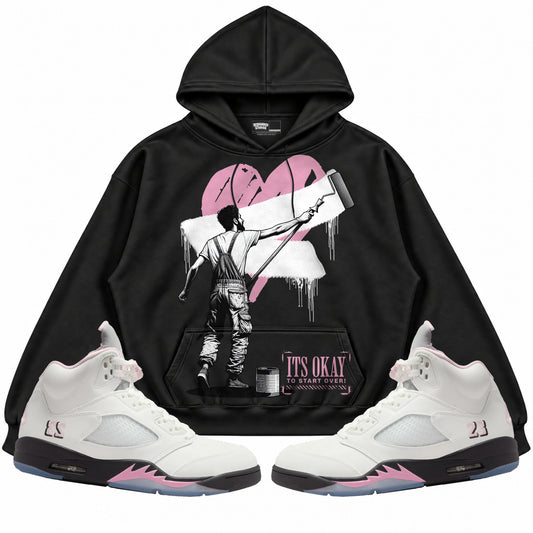 Rebranded Studios apparel — front styled with matching sneakers