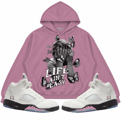 Rebranded Studios apparel — front styled with matching sneakers