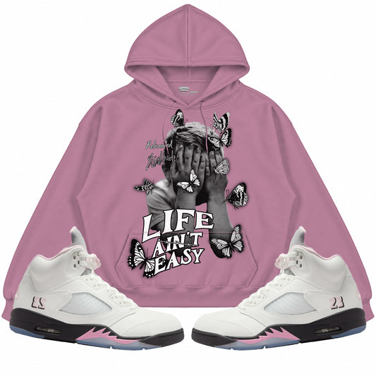 Rebranded Studios apparel — front styled with matching sneakers