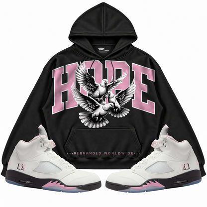 Rebranded Studios apparel — front styled with matching sneakers