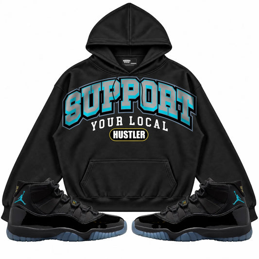 Rebranded Studios Support Your Local Hustler Air Jordan 11 Gamma Blue Black hoodie — front with sneakers