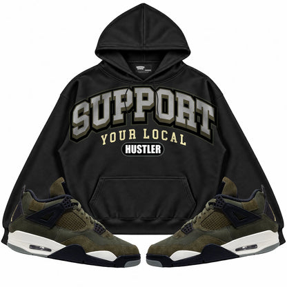 Rebranded Studios Support Your Local Hustler Air Jordan 4 Craft "Olive" Black hoodie — front with sneakers