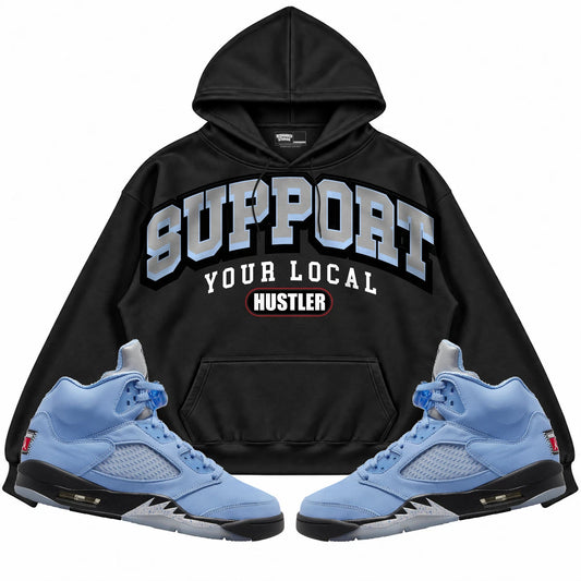 Rebranded Studios Support Your Local Hustler Air Jordan 5 UNC Black hoodie — front with sneakers