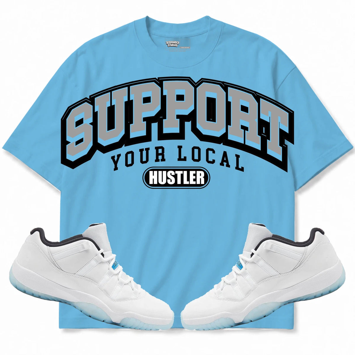 Rebranded Studios Support Your Local Hustler Air Jordan 11 Legend Blue Collection light blue shirt — front with sneakers