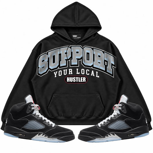Rebranded Studios Support Your Local Hustler Air Jordan 5 Black Metallic Reimagined Black hoodie — front with sneakers