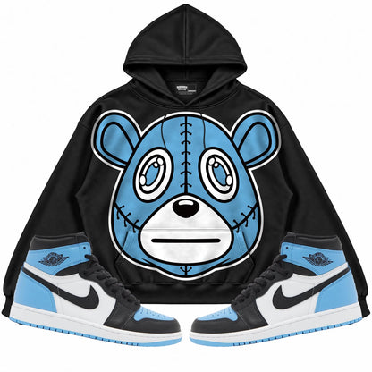 Rebranded Studios Rebranded Bear Air Jordan 1 High OG UNC Toe Black hoodie — front with sneakers