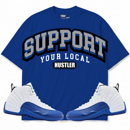 Rebranded Studios Support Your Local Hustler Air Jordan 12 Blueberry royal blue shirt — front with sneakers