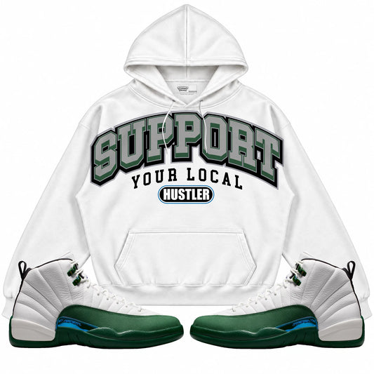 Rebranded Studios Support Your Local Hustler Air Jordan 12 Bucks Collection white hoodie — front with sneakers