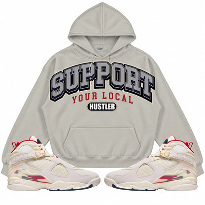 Rebranded Studios Support Your Local Hustler AIR JORDAN 8 X SOLEFLY “MI CASA ES SU CASA" Warm Off-White Light Stone hoodie — front with sneakers