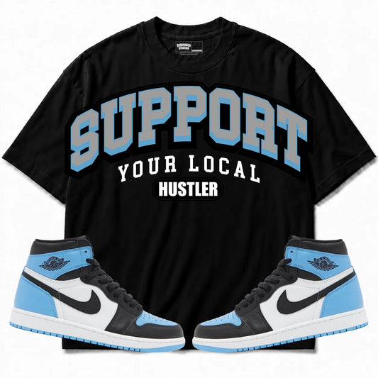 Rebranded Studios Support Your Local Hustler Air Jordan 1 High OG UNC Toe Black shirt — front with sneakers