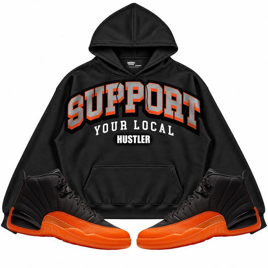 Rebranded Studios Support Your Local Hustler Air Jordan 12 Brilliant Orange Black hoodie — front with sneakers