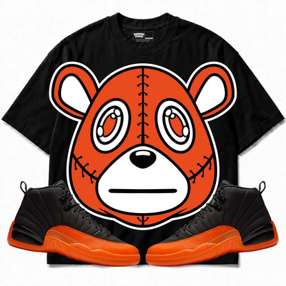 Rebranded Studios Rebranded Bear Air Jordan 12 Brilliant Orange Black shirt — front with sneakers