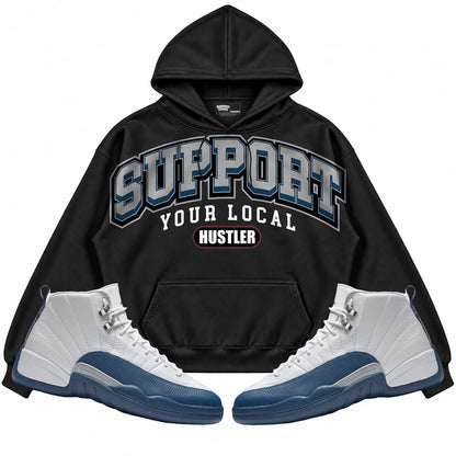 Rebranded Studios Support Your Local Hustler Air Jordan 12 French Blue Black hoodie — front with sneakers