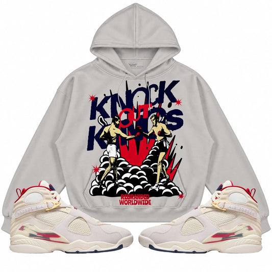 Rebranded Studios Knock Out Kings AIR JORDAN 8 X SOLEFLY “MI CASA ES SU CASA" Collection light warm gray hoodie — front with sneakers