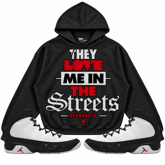Rebranded Studios They Love Me In The Streets Air Jordan 9 OG Space Jam Collection black hoodie — front with sneakers