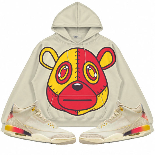 Rebranded Studios Rebranded Bear Air Jordan 3 J Balvin Medellín Sunset Cream hoodie — front with sneakers