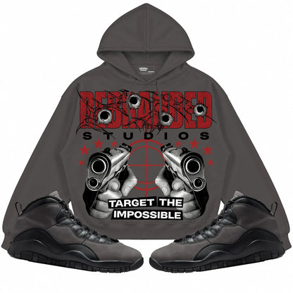 Rebranded Studios Target The Impossible Air Jordan 10 Shadow Collection dark charcoal gray hoodie — front with sneakers