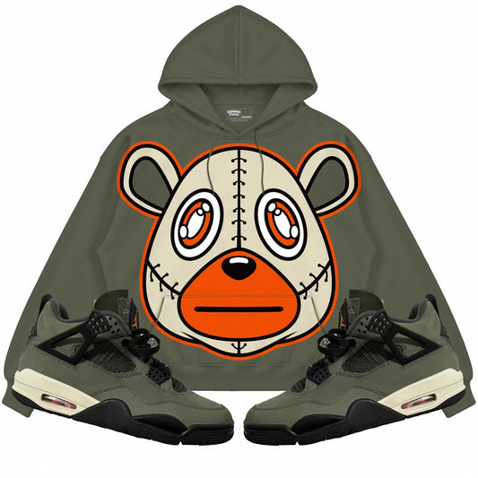 Rebranded Studios Rebranded Bear Air Jordan 4 Undefeated olive hoodie — front with sneakers