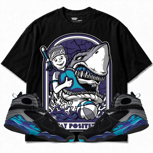 Rebranded Studios Stay Positive Air Jordan 8 Aqua Collection black shirt — front with sneakers