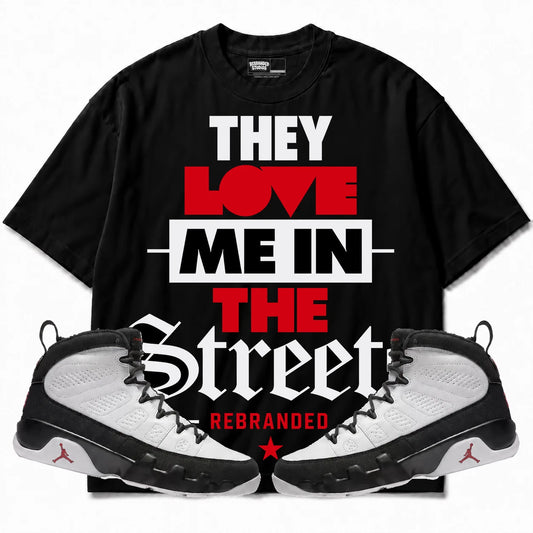 Rebranded Studios They Love Me In The Streets Air Jordan 9 OG Space Jam Collection black shirt — front with sneakers