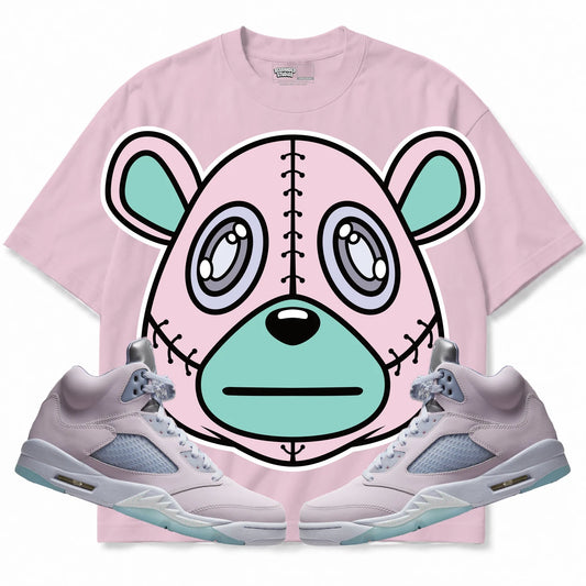 Rebranded Studios Rebranded Bear Air Jordan Retro 5 Easter/Regal Pink pastel pink shirt — front with sneakers