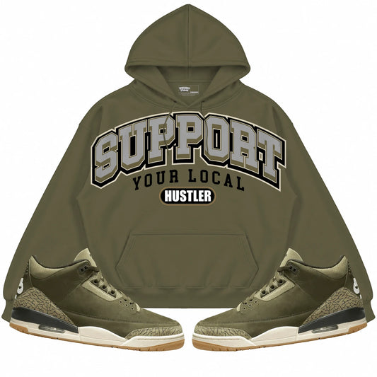 Rebranded Studios Support Your Local Hustler Air Jordan 3 Family Affair Olive hoodie — front with sneakers