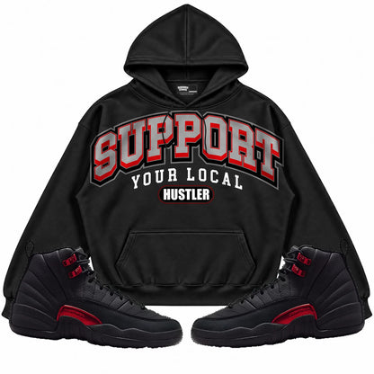 Rebranded Studios Support Your Local Hustler Air Jordan 12 Bloodline Black hoodie — front with sneakers